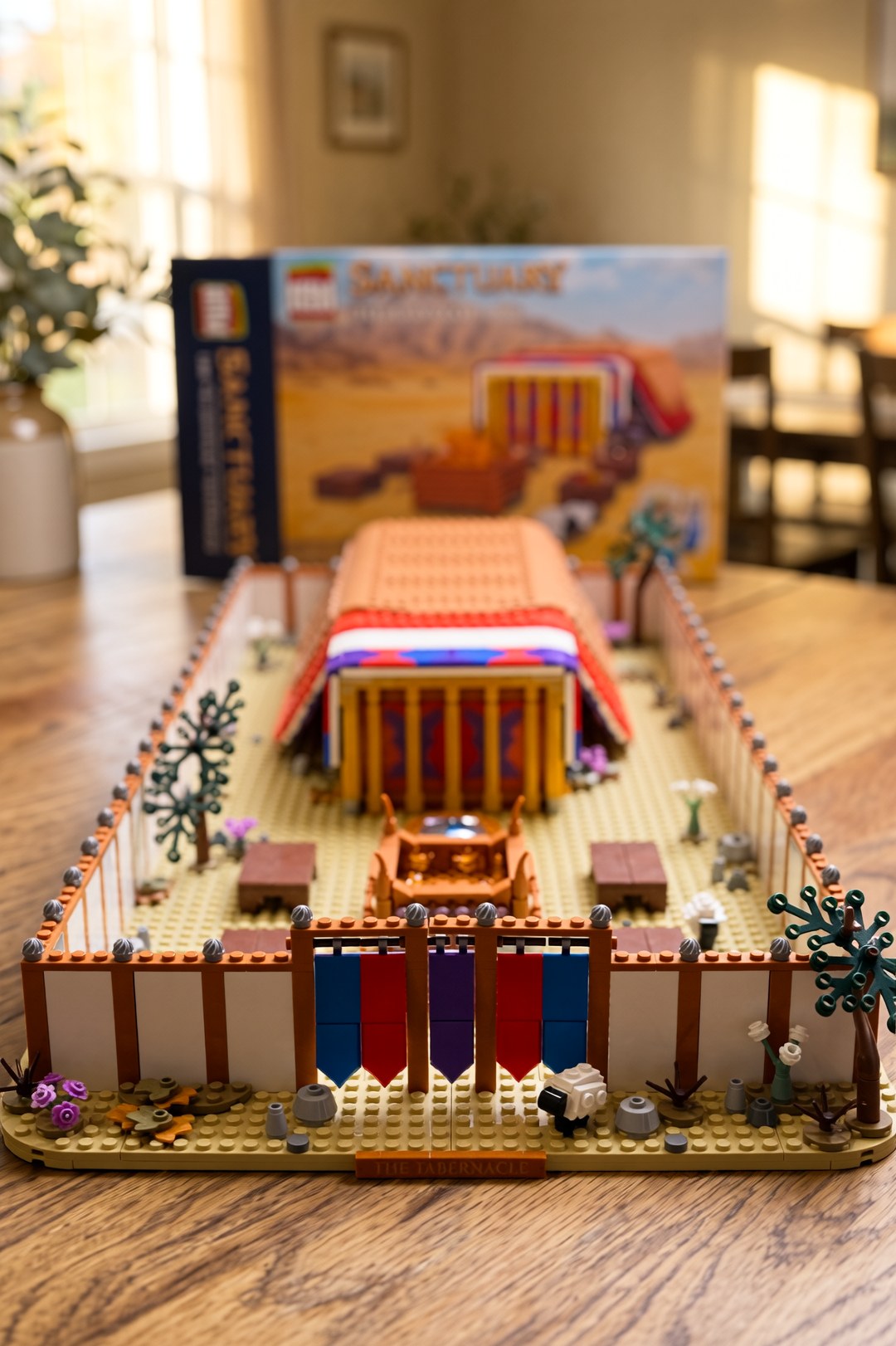 Bible Bricks Wilderness Tabernacle set and box on a family dining table in warm afternoon light